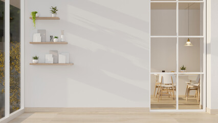 The interior design of a minimal Scandinavian home corridor features a window showing a dining room.