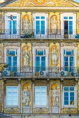 House facade decorated with ceramics Azulejos tiles in Lisbon, Portugal