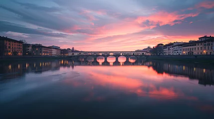Papier Peint photo Ponte Vecchio A bridge over the calm Arno river in Florence Italy