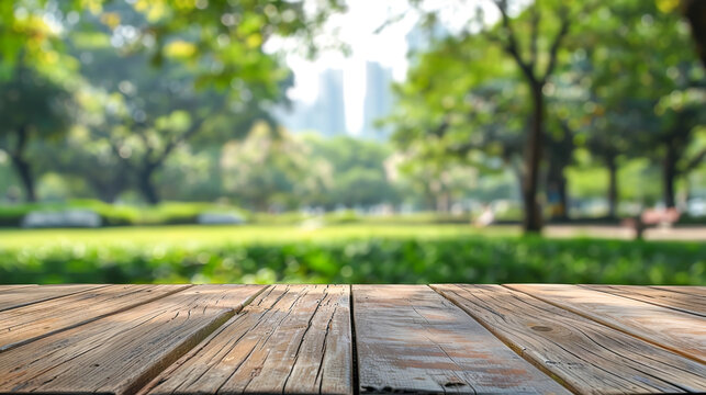 
Empty wooden table with blurred city park on background 