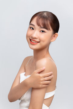 Beauty cute fashion model with natural make up on white background