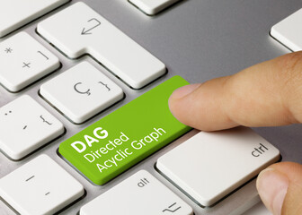 DAG Directed Acyclic Graph - Inscription on Green Keyboard Key.