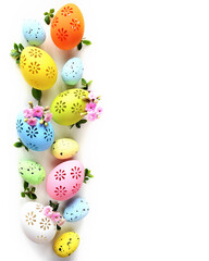 Fototapeta na wymiar Collection of stylish colors eggs with flowers for Easter celebration on white background.