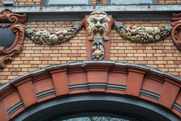 retail of architecture on ancient building facade in Lille France - 751302370