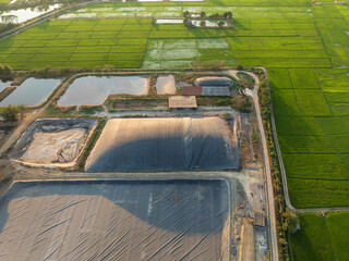 Covered lagoon digester for biogas production from poultry farm.
