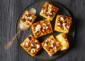 slices of yogurt cake with nuts and dried berries