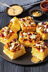 slices of yogurt cake with nuts and dried berries