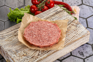 Raw beef uncooked burger cutlet