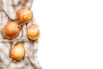 Obraz na płótnie Canvas Fresh onions and napkin isolated on white background.