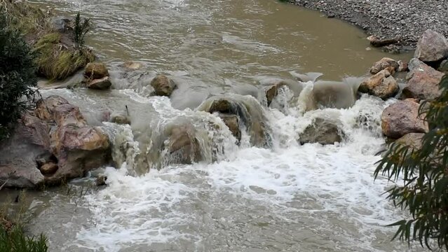 Water flowing over rocks in Hammam Guergour, Setif, Algeria.