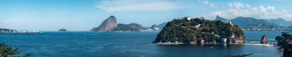 Fototapeta na wymiar Panoramic View of Tropical Coastline with Iconic Mountains