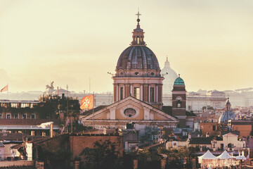 Fototapeta na wymiar Basilica San Carlo al Corso in Rome. View from top of Spanish Steps. Roof top. Rome, Italy