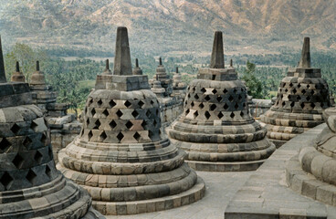 Stupa's at Borobudur temple Java Indonesia in the eighties. 