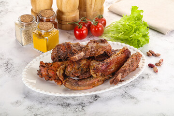 Roasted duck wings with sauce