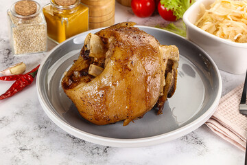Baked pork knee with spices