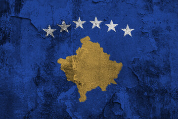 Republic of Kosovo Flag Cracked Concrete Wall Textured Background