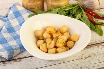 Roasted delicous scallop in the bowl