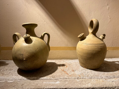 Two different clay jugs called botijo in spanish. A traditional mud jar used to keep fresh water inside.