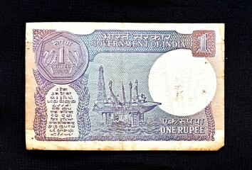 Indian One rupee currency note, Government of India one rupee old banknote Indian currency, Old Indian Currency note on the table