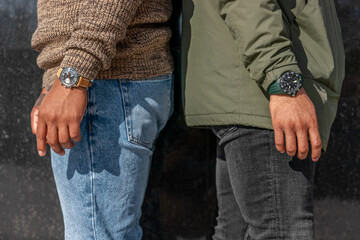 Two boys with analog wrist watch