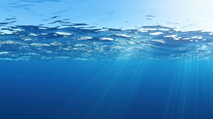 Sun rays cascading through the cobalt underwater world