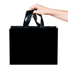 Hand caucasian woman holding black shopping, gift bag with copy space, isolate on transparent...