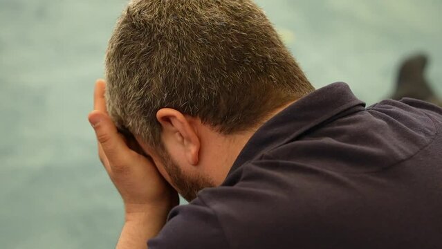Religious muslim man praying inside the mosque