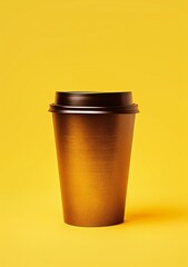 a brown coffee cup with a lid