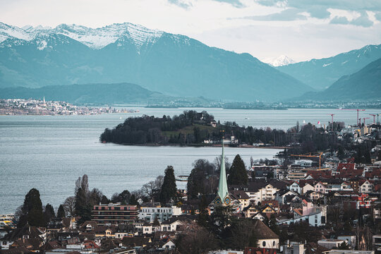 View of halbinsel Au, taken from Horgen, zurich switzerland, zurich lake, alps, cinematic, selective focus