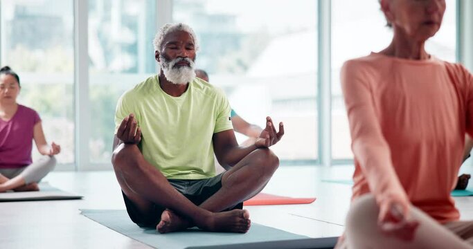 Man, lotus and meditating in yoga class for peace, calm and mental health with wellness or mindfulness. People or group eyes closed for spiritual, holistic and breathing exercise to relax or chakra
