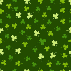 Clover seamless pattern, tree leaf clovers for Saint Patrick's Day on dark green background. Vector repeat illustration