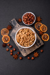 Delicious fresh peeled raw walnuts in a ceramic plate