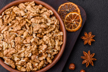 Delicious fresh peeled raw walnuts in a ceramic plate