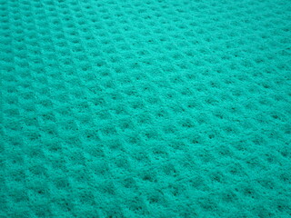 Sponge fibers sponge texture pattern surface close-up green background