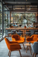 Cozy and stylish modern office interior with vibrant orange armchairs and natural light
