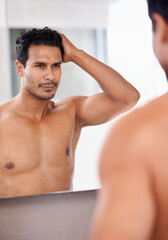 Bathroom mirror, body and man with hair check in a house for skincare, wellness or morning routine....