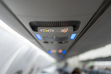 Fasten seat belt sign and prohibit the use of any electronic devices While the plane is taking off...