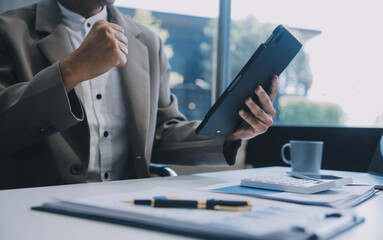 Obraz premium Office, tablet and business man happy for positive financial savings, finance budget report or administration feedback. Growth analytics, data analysis review and person smile for research statistics