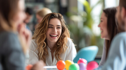  A candid photo shows a content businesswoman having fun with an Easter egg hunt in the office while her coworkers giggle around her