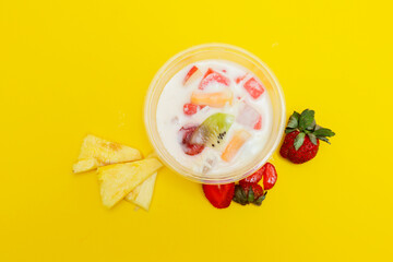 es buah or sup buah is indonesian fruit cocktail ice desert, contains strawberry, pineapple, and...