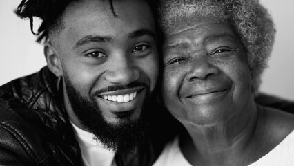 Joyful Generational Portraits Elderly Grandmother in 80s with Smiling Adult Son in 20s, monochrome...