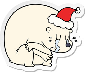 crying sticker cartoon of a polar bear wearing santa hat