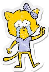 distressed sticker of a cartoon cat