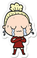sticker of a cartoon crying old lady