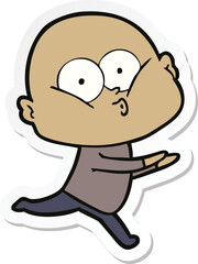 sticker of a cartoon bald man staring