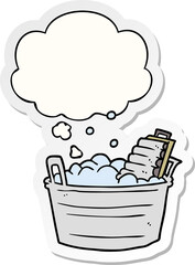 cartoon old washboard and bucket and thought bubble as a printed sticker