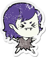 distressed sticker of a annoyed cartoon vampire girl