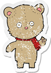 retro distressed sticker of a cartoon waving teddy bear