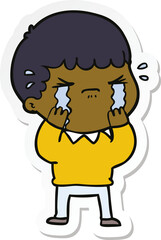 sticker of a cartoon man crying