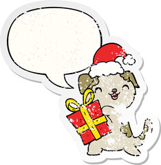 cute cartoon puppy and christmas present and hat and speech bubble distressed sticker